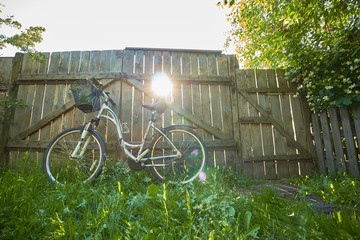 bicycle at the gate of the village