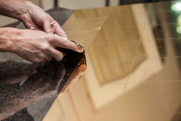 gold leaf pieces on the glass