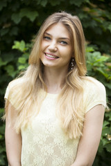 Naklejka premium Portrait close up of young beautiful blonde woman
