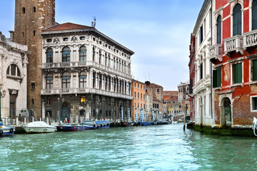 Venice. Italy. Bright ancient buildings ashore Canal Grande..