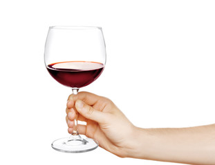 Male hand holding glass of wine isolated on white