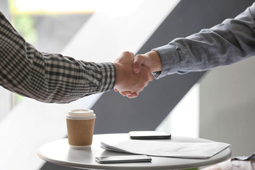 Business people handshaking