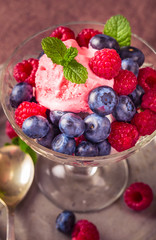 Ice cream with raspberries and blueberries