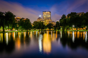 The lake at the Public Garden and buildings at Copley at night,