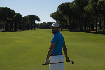 Obraz premium golf player portrait from back