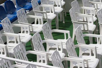 empty seats, white plastic chairs  