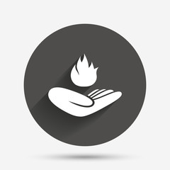 Insurance against fire. Hand holds fire flame.