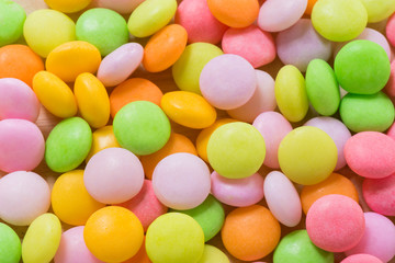 Fototapeta na wymiar Colorful sugary candy or chocolate candy background
