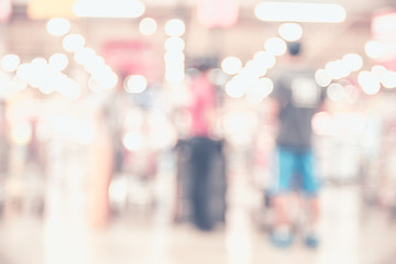 Blurred background, Customer shopping at supermarket store with