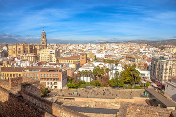 Naklejka na ściany i meble Panoramic view at Alcazaba of Malaga with skyline of city, the best preserved Moorish fortress palace in Andalusia, Spain.