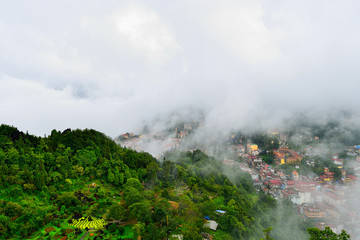 Fototapeta na wymiar Sapa city in the mist at Sapa in Vietnam
