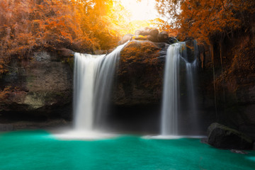 Fototapeta na wymiar Amazing beautiful waterfalls in autumn forest at Haew Suwat Waterfall in Khao Yai National Park, Thailand