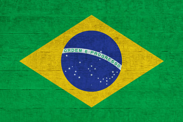 .Flag of Brazil painted on cement wall, background texture