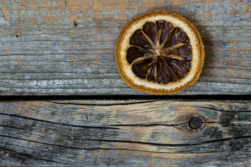 Fototapeta na wymiar dried citrus on a beautiful wooden background
