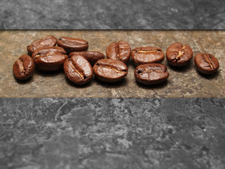 Roasted Coffee beans on texture floor