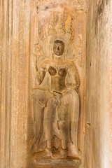 Apsara sculpture on the wall of Angkor Wat, Seam Reap, Cambodia.