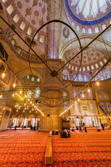 Istambul - The Sultan Ahmed Mosque, popularly known as the Blue Mosque. The ceiling with paintings....