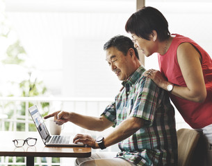 Elderly Senior Couple Computer Home Concept