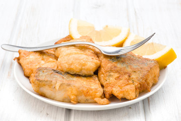 pieces of fried hake dish with lfork