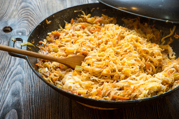 Cooking chongqing noodles vegetables in wok at home
