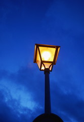 Fototapeta na wymiar Old street lamp in the evening