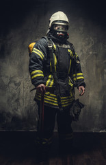Fototapeta premium Portrait of firefighter in oxygen mask.