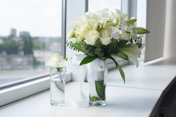 Beautiful wedding bouquet in a glass vase