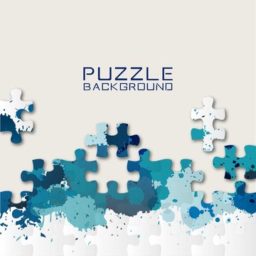 Blue puzzle pieces and paint splashes background
