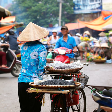 Street vendor with the bicycle, Vietnam, Hanoi. Street Market