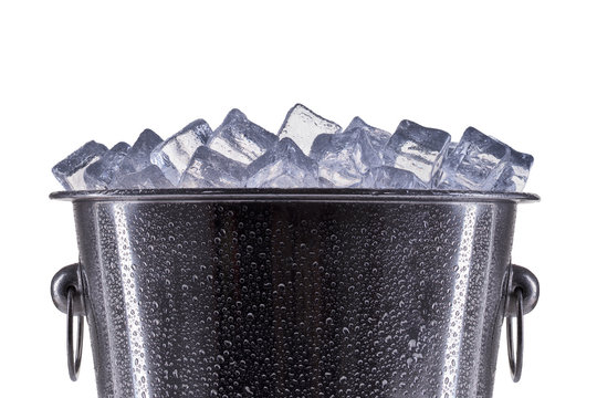 Metal champagne ice bucket with drops isolated on a white background.