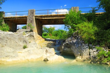 Bridge over turquoise creek 