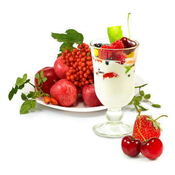 isolated image of yogurt in a glass with fruit on a white background close up