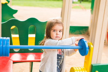 Fototapeta na wymiar beautiful girl on playground