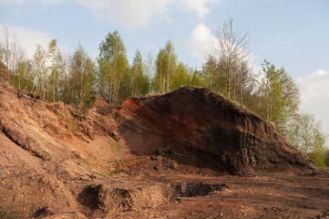 Waste heaps of red rock Chervonograd geological and industrial district