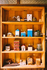 Small wood house model  in woodshelf interior decorate
