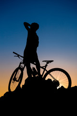 Obraz premium Mountain biker silhouette