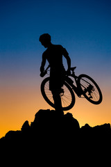 Fototapeta na wymiar Mountain biker silhouette
