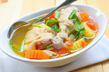 Chicken soup chicken soup with vegetables in a bowl
