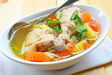 Chicken soup chicken soup with vegetables in a bowl
