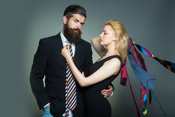 young couple with tie