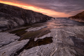 Dramatic light during sunrise on the island Esusaret, Russia, Karelia, Ladoga lake