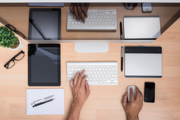 Top view office hand working with keyboard mouse