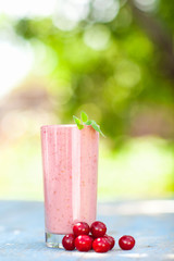 Smoothie with cherry and mint in a glass