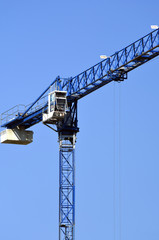 Fototapeta na wymiar Construction crane on a blue sky