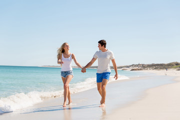 Romantic young couple on the beach