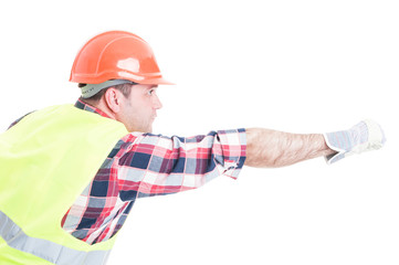 Builder in superhero pose doing fly gesture
