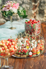 Assortment of canapes. Banquet service.