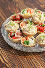 Assortment of canapes. Banquet service.