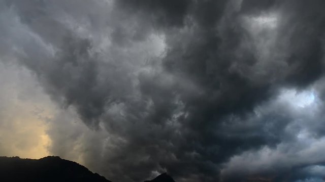 Dangerous clouds on the sky. Thunderstorm over the mountain. Swiss Alps. Uri.