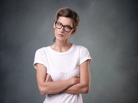 Angry woman with glasses
